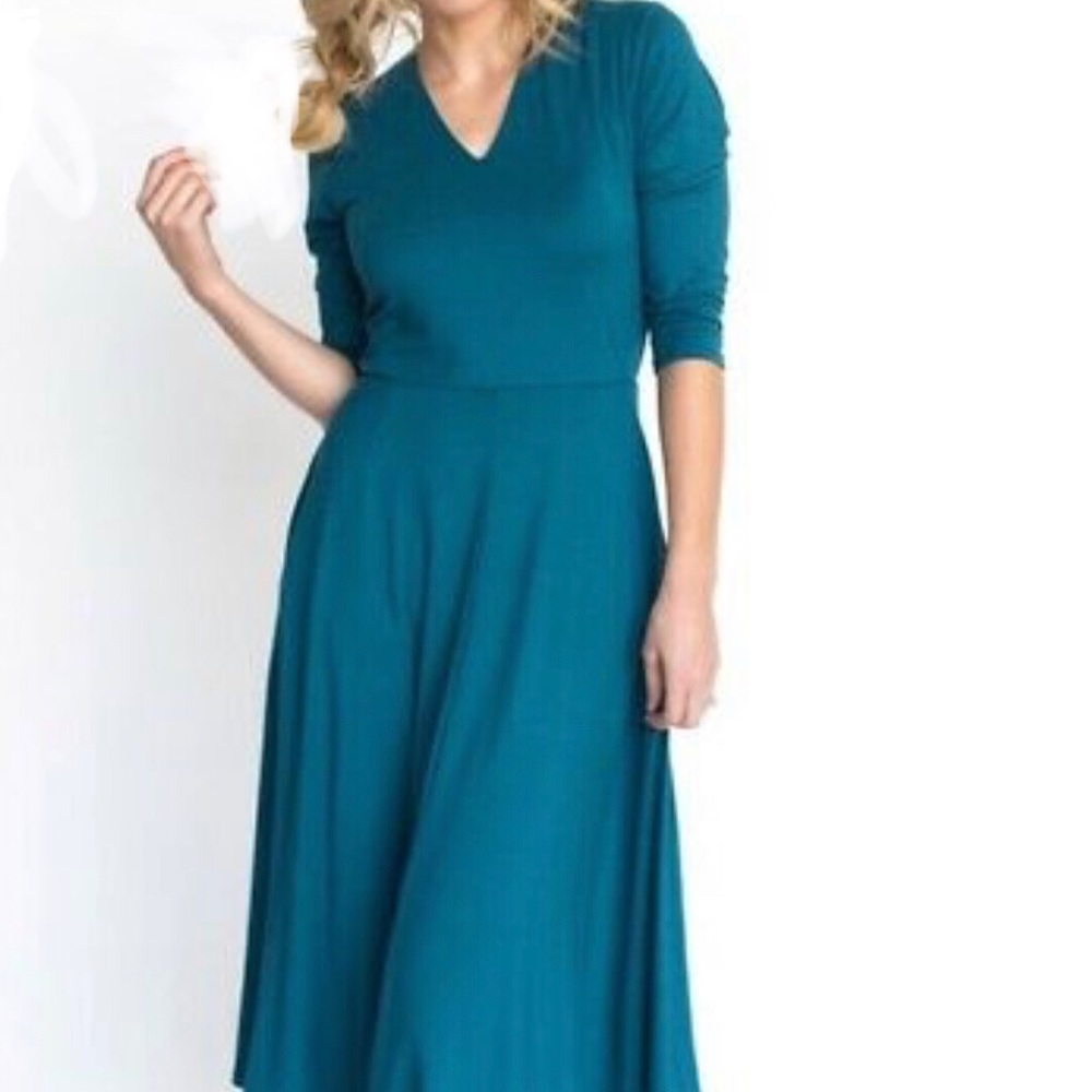 Teal V neck midi dress.